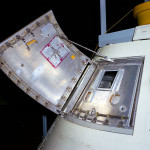 Block I hatch consisted of two pieces and required pressure inside the cabin be no greater than atmospheric to open